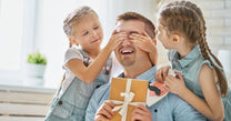 Daughters congratulating dad