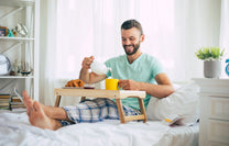 Dad having breakfast in bed